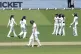 England's Lauren Bell (centre) walks off after being bowled out by India's Deepti Sharma, who celebrates with team-mates, during day four of the first Women's Test at Lord's Cricket Ground, London, July 13, 2026