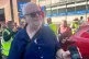 Peter Crane, who has driven for Arriva for 22 years, shows a photo of a temperature reading from inside his cab at 44C, as he takes part in strike action at Wood Green Bus station in north London, August 14, 2026