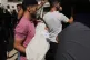 Mourners carry the body of Palestinian child Azzam Abu Al-Teif, who was killed in an Israeli air strike alongside his father, Abdullah Abu Al-Teif, during their funeral in Gaza City