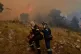 Greece firefighters battle a blaze near Athens