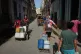 People carry water during a power outage in Havana, Cuba