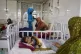 Afghan women care for their children in the malnutrition ward at Indira Gandhi Children's Hospital in Kabul, Afghanistan, Feb. 15, 2026. (AP Photo/Siddiqullah Alizai, File)