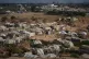 Palestinian children play in an open area at a makeshift camp for displaced people in Deir al-Balah, central Gaza Strip, August 7, 2026