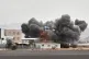 An explosion at the Sanaa International Airport compound during what the Iranian-backed Houthi rebels in Yemen said were several Saudi airstrikes in Sanaa, Yemen, July 13, 2026