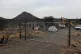 A gate is shown at a mining site where at least 14 artisanal miners died near Rustenburg, South Africa, August 11, 2026