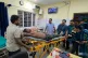 An injured person is moved for treatment at a hospital after the collapse of an under-construction tunnel at a hydropower project in Chamoli district of Uttarakhand, India, August 13, 2026