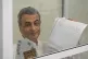 Lev Shlosberg, 2nd right, senior member of the Yabloko party, stands in the defendant's box prior to a verdict in the case against him is delivered, in a court in Pskov, Russia, August 17, 2026