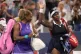 Serena Williams (left) and (right) Venus Williams wave to the crowd at the end of a women's doubles match against Marta Kostyuk and Peyton Stearns at the Cincinnati Open tennis tournament, August 17, 2026