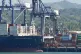 Cranes load a cargo ship at Panama Canal's Port of Balboa, managed by CK Hutchison Holdings, in Panama City, January 30, 2026