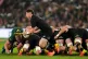  New Zealand's Cam Roigard, center, runs with the ball during a Test rugby match between South Africa and New Zealand, in Johannesburg, South Africa, August 22, 2026