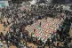 ENOUGH SAID ACT NOW: Bodies of members of the Hassayna and Abu Sharia families, killed in an Israeli strike in 2023 have recently been recovered from the rubble are given a proper burial in Gaza City on August 4 2026