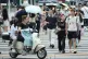 ENVIABLE APPROVAL RATES: A street scene from Beijing, yesterday. A 13-year study by the Harvard Ash Center, have found satisfaction with the central government running above 90 per cent – a figure no Western government has approached in living memory
