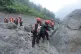 	Nepal army soldiers using a drilling machine during a rescue operation at the site of a hydropower project in Upper Trishuli, Nepal, August 30, 2026