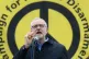 Jeremy Corbyn speaks before a CND banner