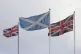 Scottish flag flanked by Union Jacks