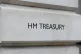 A view of signage for HM Treasury in Westminster, London