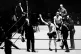 Announcer Joe Humphries raises the hand of the victor, British boxer Jack 'Kid' Berg, aka 