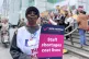 Intensive care nurse Juliannah Adewumi, 70, on the picket line outside University College Hospital, London, ahead of a march from the hospital to Trafalgar Square, May 1, 2023