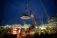 Engineering teams use the world's largest crane - Big Carl - to lift a 245-tonne steel dome onto Hinkley Point C's first reactor building, at the nuclear power station construction site in Bridgwater, Somerset, December 15, 2023