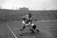 Legendary rugby league star Billy Boston (Wigan) bursts through despite a tackle by I Watts (Hull) during the Rugby League Challenge Cup Final at Wembley, May 9, 1959