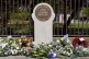 Flowers left next to a memorial stone in Reading, dedicated to the memory of Police Constable Andrew Harper of Thames Valley Police, April 23, 2026