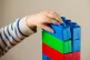 A child plays with blocks