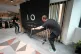 Government staff prepare a number 10 North sign for a media interview during a National Economic Council meeting at No 10 North, located in Heron House, central Manchester, July 24, 2026