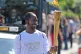 Jason Arday carries the Olympic Flame, July 23, 2012