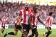 Brentford's Michael Kayode (right) celebrates scoring their side's third goal of the game with team-mates during the Premier League match at the Community Stadium, London, August 22, 2026