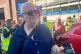 Peter Crane, who has driven for Arriva for 22 years, shows a photo of a temperature reading from inside his cab at 44C, as he takes part in strike action at Wood Green Bus station in north London