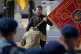 Ukraine's President Volodymyr Zelensky hands over the flag of a military unit during the Ukraine Independence Day ceremony in Kyiv, Ukraine, August 24, 2026