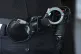 A police officer wearing handcuffs and a PAVA spray on a belt, at New Scotland Yard in central London, September 25, 2025