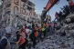 Palestinian civil defence crews carry a body from the rubble of a collapsed building that housed displaced Palestinians and was heavily damaged during Israel’s attack on Gaza, in Gaza City, September 16, 2026