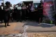 Members of a women's church group pay their respects at the site where the body of a woman was discovered the previous week, in Kempton Park, South Africa, east of Johannesburg, September 17, 2026