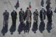 Shiite clerics carrying rifles march during the state-organised ‘Janfada’, or ‘Sacrifice for Iran’, military-style parade at Revolution Square in Tehran, Iran, September 18, 2026