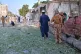 Soldiers and local residents gather at the site of a bomb explosion at a mosque in Kohat, in northwestern Pakistan, September 18, 2026
