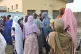 Families and relatives of miners suspected of illegal mining wait outside a hospital where their bodies are stored in Minna, Nigeria, September 17, 2026