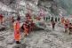 Rescuers observe a moment of silence for the victims of the August 26 mudslide near the Gyirong Port in Gyirong County, southwestern China's Tibet Autonomous Region, September 1, 2026