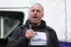 Ryan Bridge from Raise the Colours speaks during a protest in Crowborough, East Sussex
