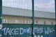 Migrants inside Yarl's Wood detention centre wave at support