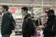 Supermarket shoppers pictured during the early days of the p