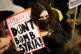 A protester opposes the bombing campaign