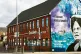 HIGH TIME: (Below) The mural painted by Belfast artist Mark 