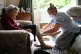 A file photo of a care worker wearing PPE