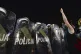 A police cordon guards the house of Poland's ruling conserva