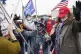 Supporters of President Donald Trump pray as they wait in an