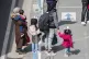 Refugees from Greece arrive at the airport in Hanover, Germa