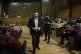 European Parliament member Ioannis Lagos, center, walks duri