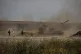 An Israeli artillery unit fires toward targets in the Gaza S