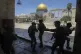Israeli security forces take positions during clashes with P